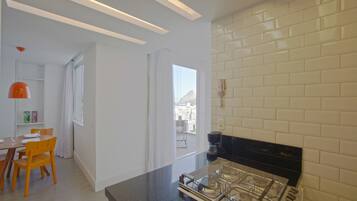 Premium Apartment | Living area | 32-inch flat-screen TV with cable channels, TV