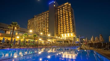 Outdoor pool, open 7:00 AM to 6:30 PM, pool umbrellas, pool loungers