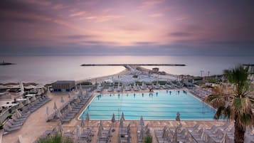 Outdoor pool, open 7:00 AM to 6:30 PM, pool umbrellas, sun loungers