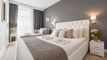 Tabla de planchar con plancha, wifi gratis y ropa de cama 