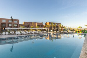 Outdoor pool, pool umbrellas, sun loungers