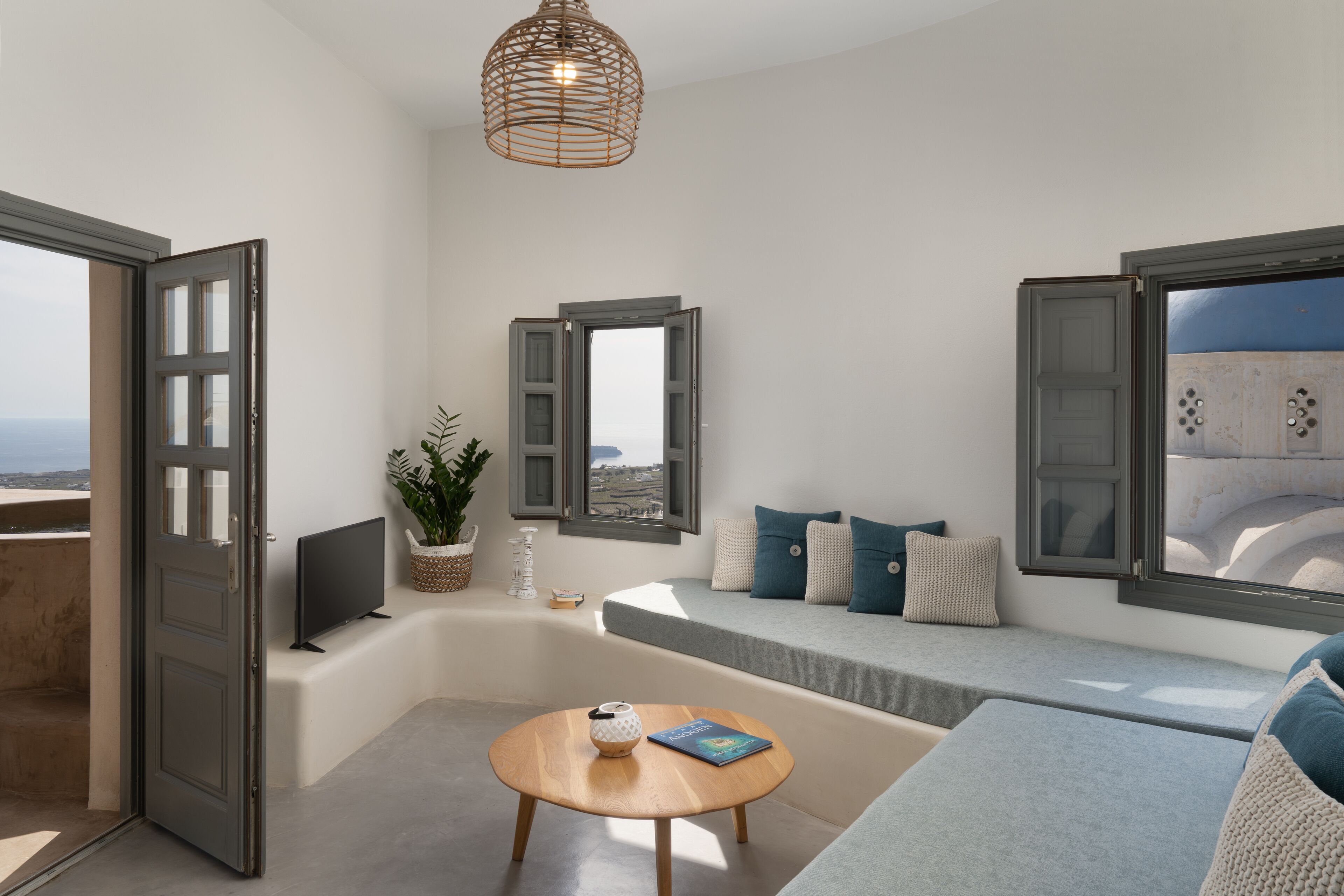 honeymoon suite, sea view (zeus) | living area | lcd tv