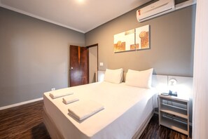 Habitación Deluxe | Minibar, cortinas opacas, wifi gratis y ropa de cama