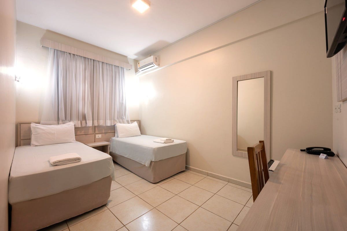 Deluxe Twin Room, 2 Twin Beds | Minibar, blackout drapes, free WiFi, bed sheets