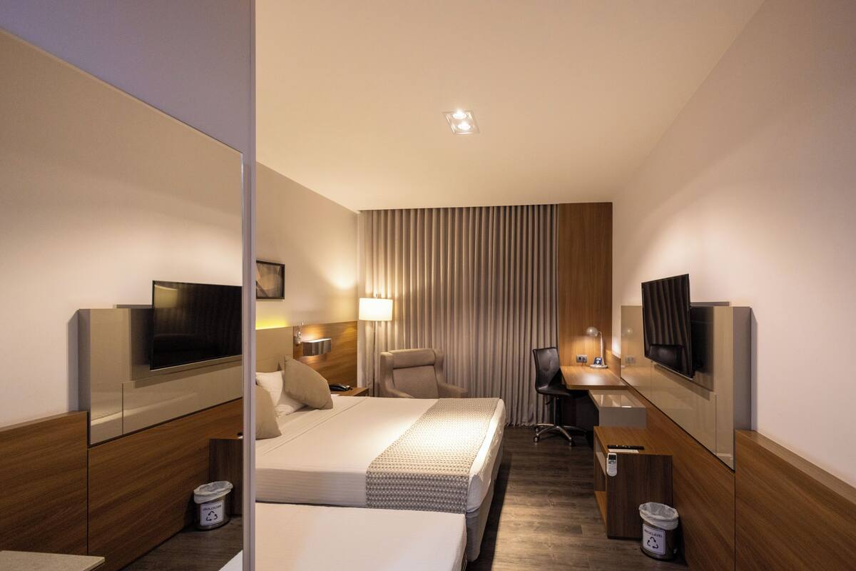 superior triple room | minibar, in-room safe, individually decorated, desk