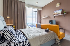 Luxury Studio Suite, 1 Bedroom, Refrigerator & Microwave, City View | Living room | 32-inch flat-screen TV with cable channels, LED TV - Luzzeri Suite Empire Damansara (Petaling Jaya)