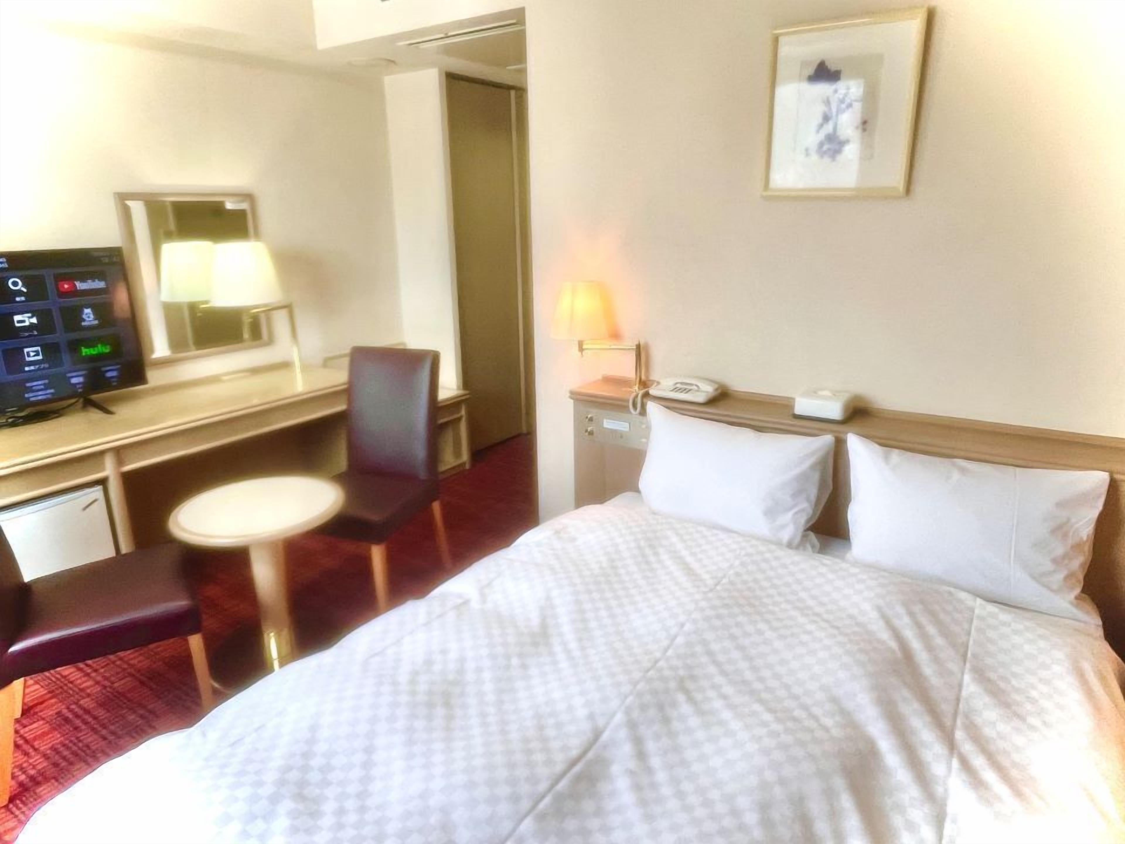 Desk, free WiFi, bed sheets