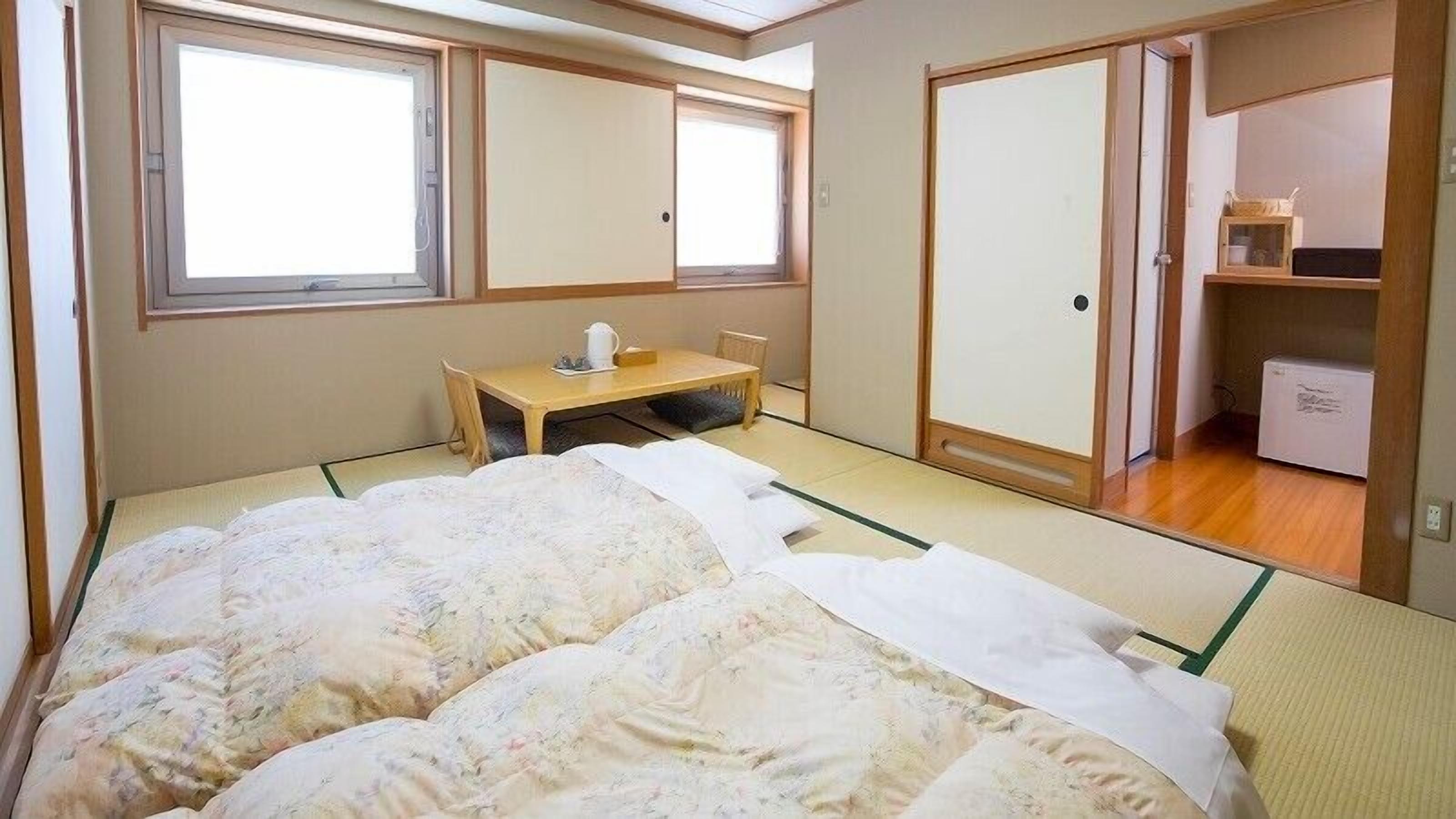 Desk, free WiFi, bed sheets