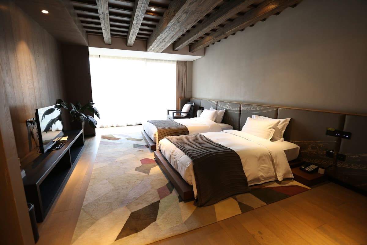Sea View Twin Room | Minibar, in-room safe, desk, blackout curtains