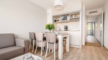 Family Apartment, 1 Bedroom | Private kitchen | Fridge, microwave, stovetop, dishwasher