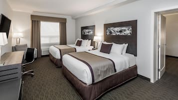 Suite, 2 Bedrooms, Non Smoking, Refrigerator & Microwave (1 King and 2 Queen) | In-room safe, desk, laptop workspace, soundproofing