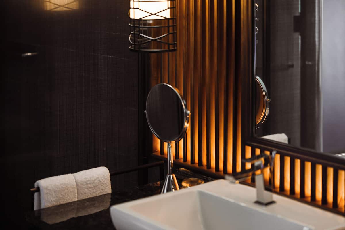 separate bathtub and shower, deep-soaking bathtub, designer toiletries