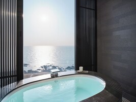 Separate tub and shower, deep soaking tub, designer toiletries