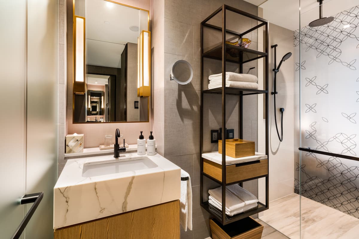shower, designer toiletries, hair dryer, bathrobes