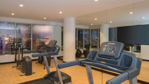 A modern gym with treadmills, a stationary bike, and a rowing machine. - ibis Styles Manama Diplomatic Area (Manama)