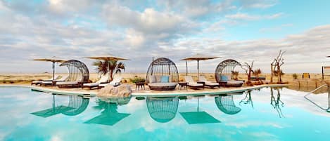 4 outdoor pools, cabanas (surcharge), pool umbrellas