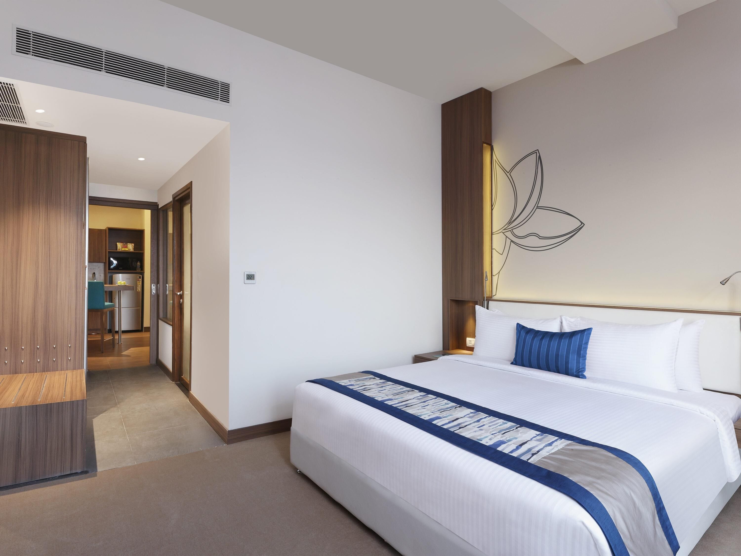 Sengetøy av topp kvalitet, memory foam-senger, minibar og safe på rommet