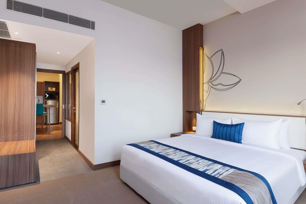Luxe beddengoed, bedden met traagschuimmatras, een minibar