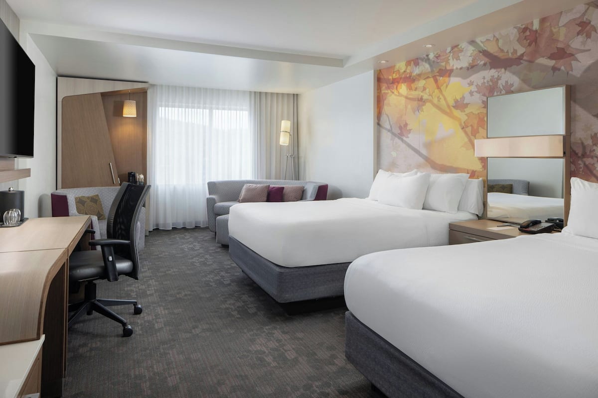 Desk, iron/ironing board, free cribs/infant beds, rollaway beds