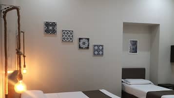 Standard Triple Room | Minibar, in-room safe, desk, blackout curtains