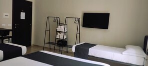 Classic Quadruple Room | Minibar, in-room safe, desk, blackout drapes - Napoli City Rooms (Naples)