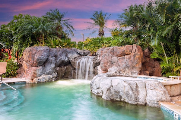 Outdoor pool, open 8:00 AM to 10:00 PM, sun loungers