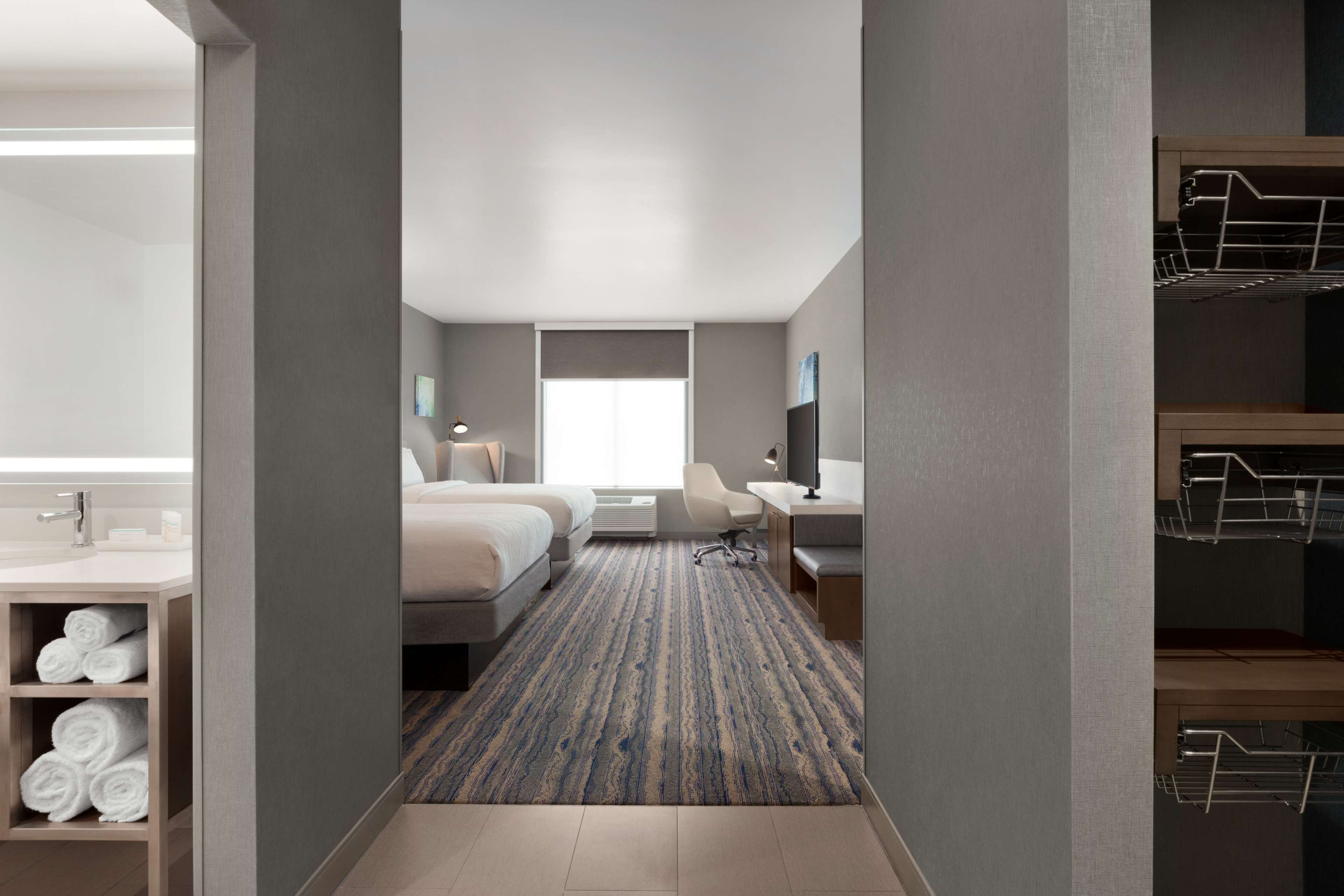 Hypo-allergenic bedding, in-room safe, desk, laptop workspace