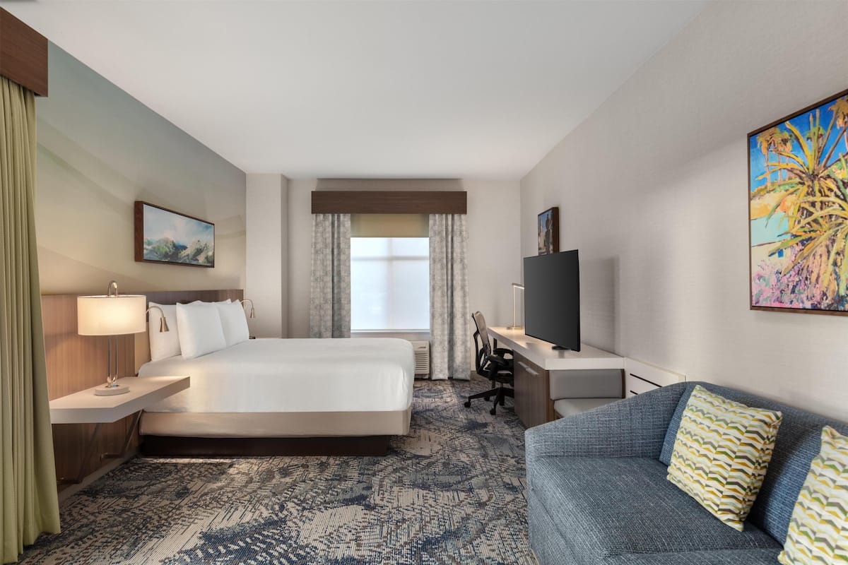 Room, 1 King Bed, Balcony, Mountain View | Living area | 50-inch LCD TV with cable channels, TV, MP3 dock