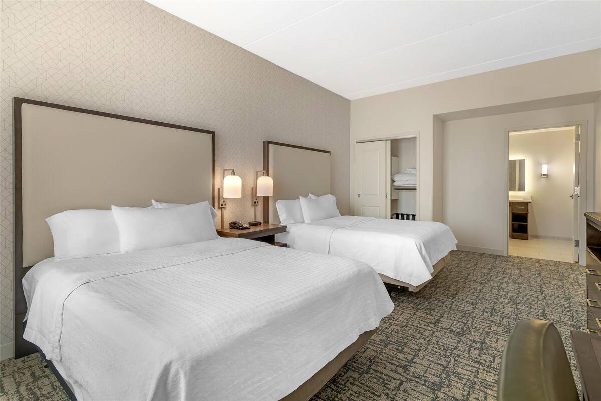 2 Queen 1 Bedroom Suite Mobility Accessible Tub Non-Smoking | Desk, laptop workspace, blackout drapes, WiFi (free)