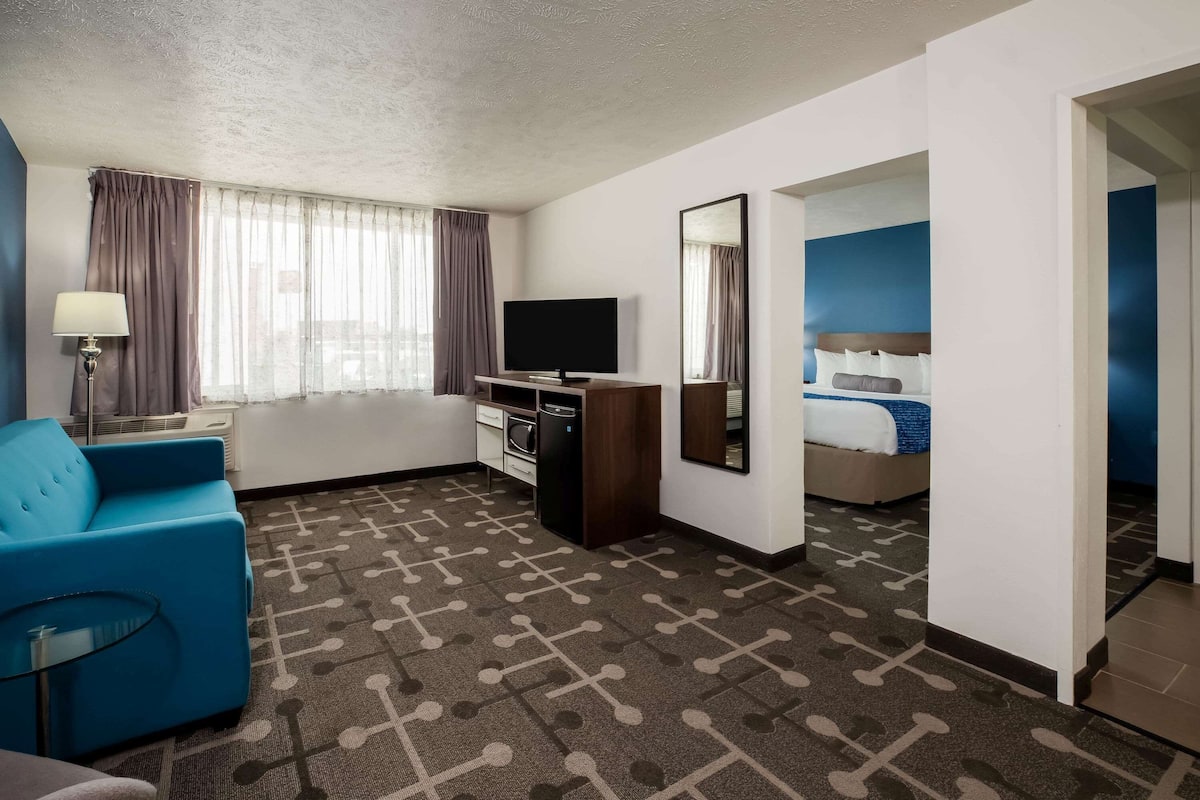 suite, 1 king bed, non smoking (two rooms) | desk, soundproofing, iron/ironing board, cots/infant beds