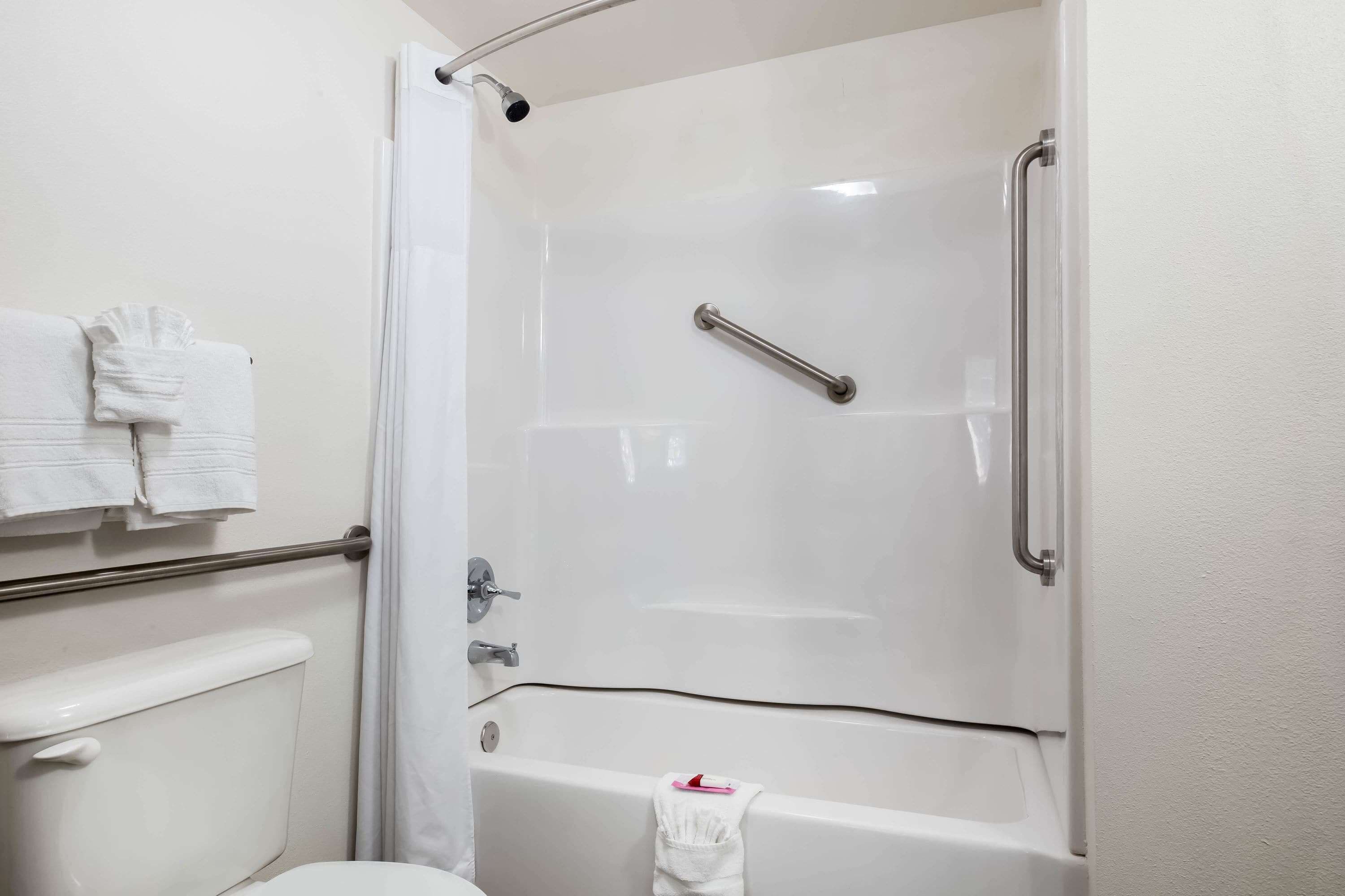 suite, 1 king bed, accessible, non smoking (two rooms) | bathroom | combined shower/bathtub, free toiletries, hair dryer, towels