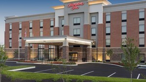 A Hampton Inn hotel with a brick facade, a covered entrance, and a parking lot. - Hampton Inn Westfield (Westfield)