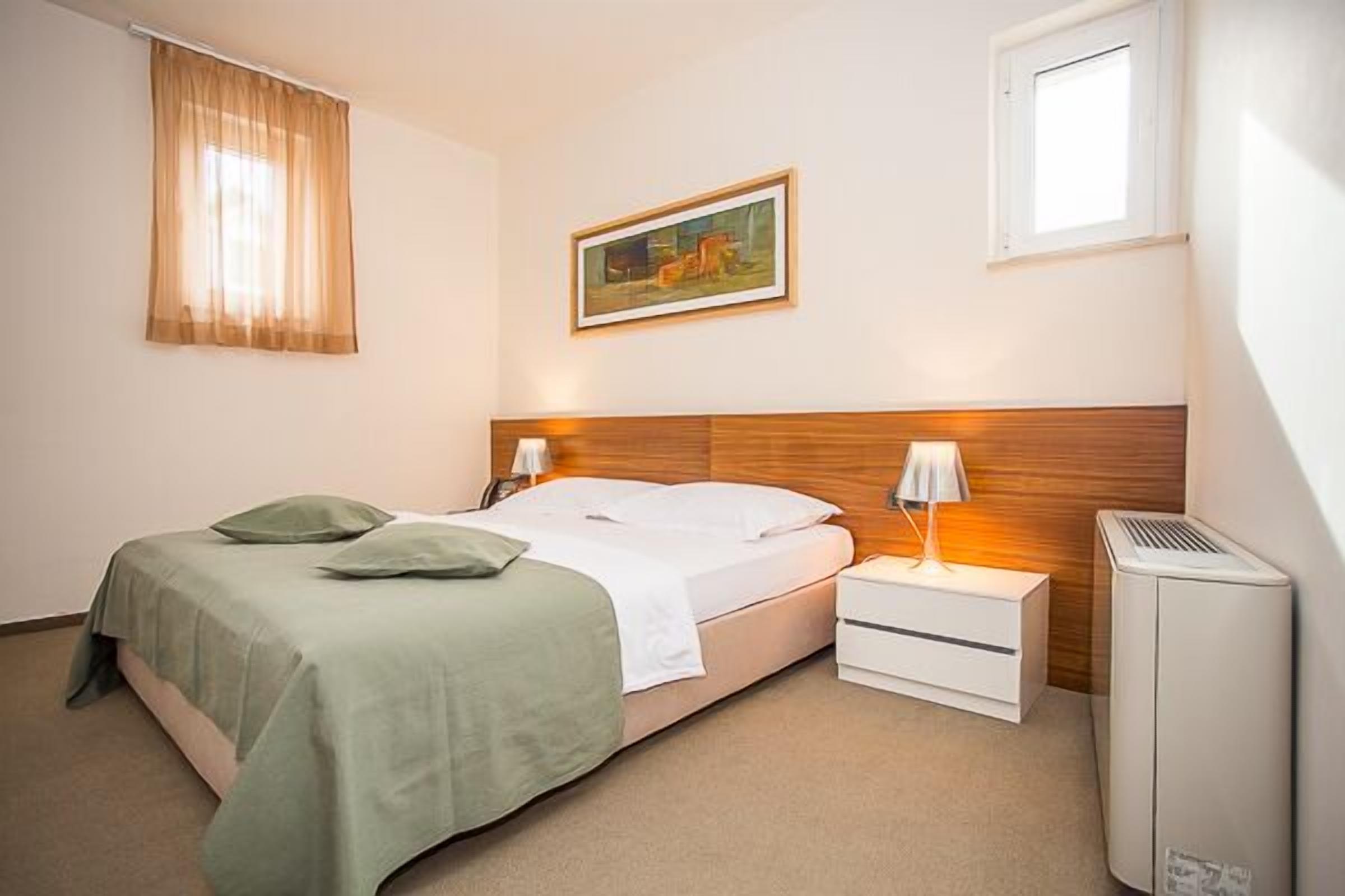 deluxe room, 2 double beds, balcony, sea view | down duvets, minibar, in-room safe, desk