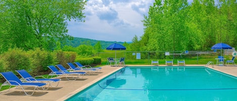 Indoor pool, outdoor pool, pool umbrellas, pool loungers