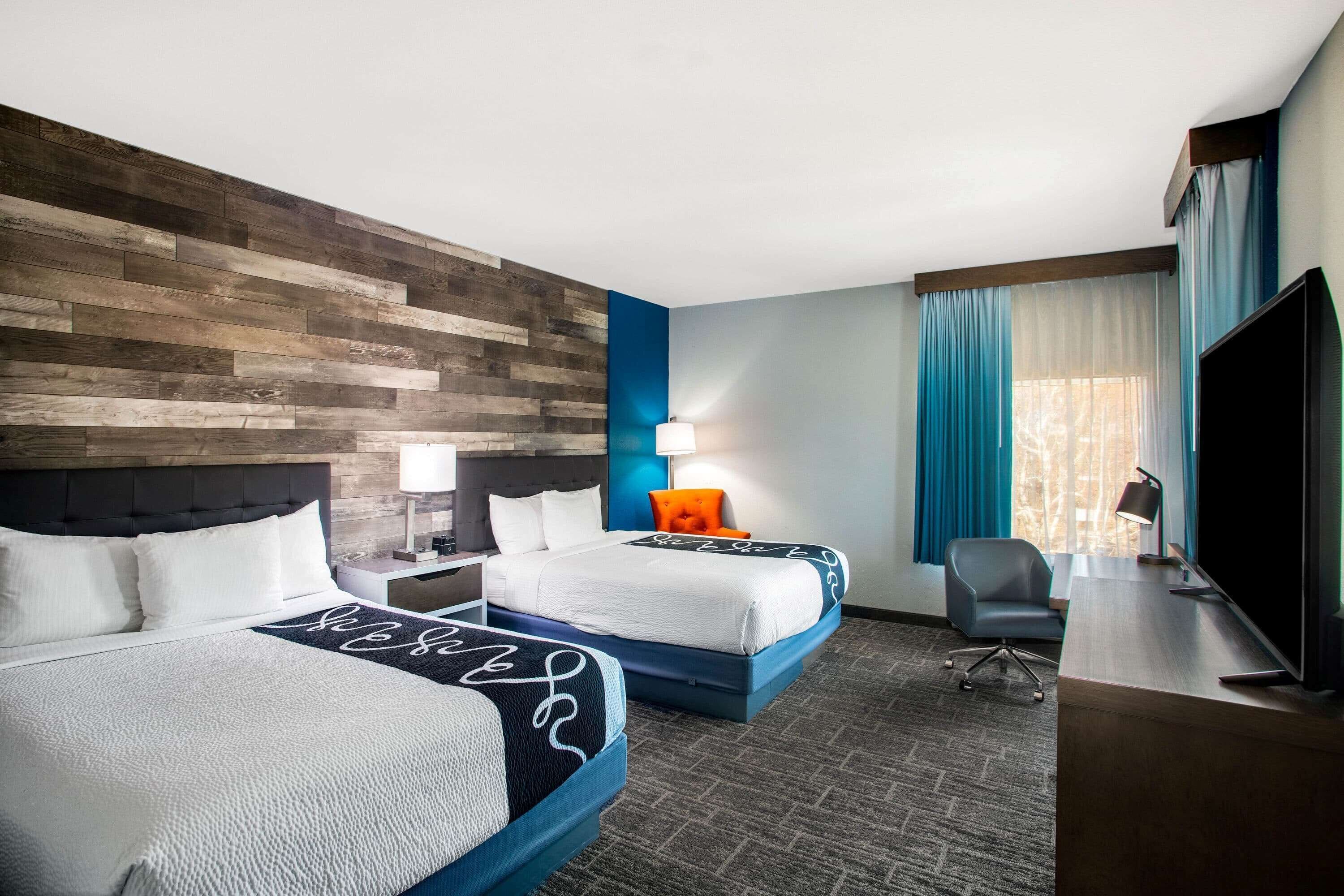 room, 2 queen beds, non smoking, city view | premium bedding, down duvets, pillow-top beds, desk