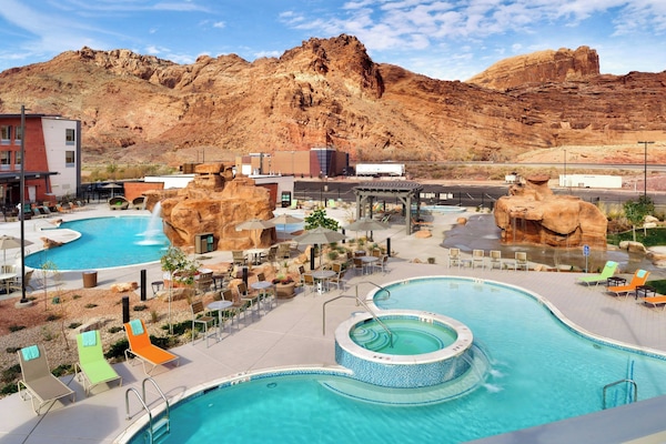 2 outdoor pools, open 8:00 AM to 11:00 PM, pool umbrellas, sun loungers
