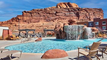 2 outdoor pools, open 8:00 AM to 10:00 PM, pool umbrellas, pool loungers