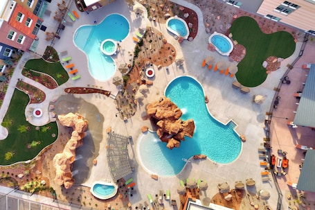2 outdoor pools, open 8:00 AM to 10:00 PM, pool umbrellas, sun loungers