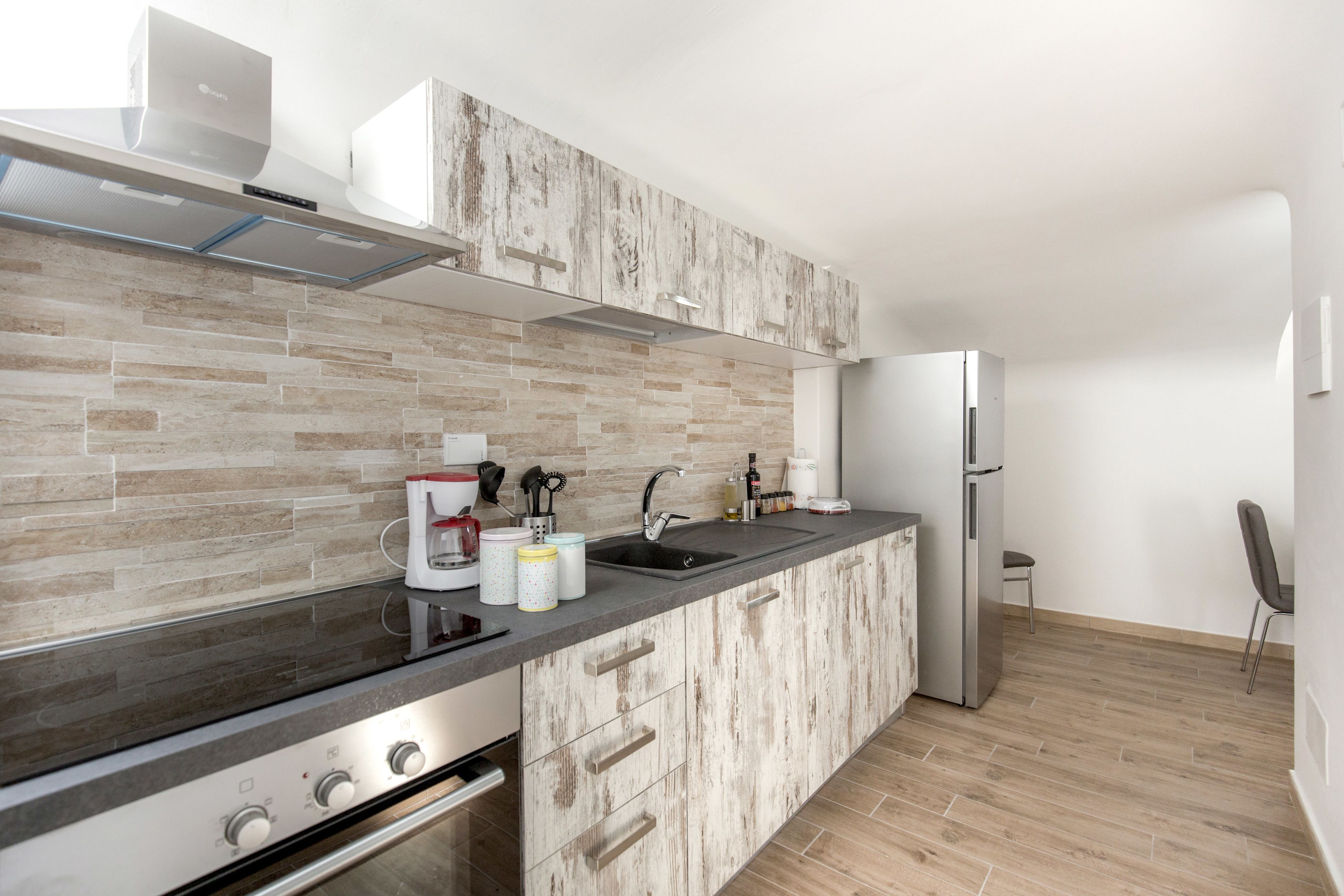 Camera familiare (raggiungibile con due rampe di scale) | Private kitchen | Fridge, espresso maker, coffee/tea maker, electric kettle