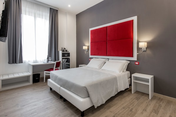 1 habitación, cubrecamas, colchones con pillow-top y minibar 