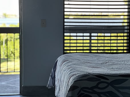 Premium bedding, desk, laptop workspace, free WiFi