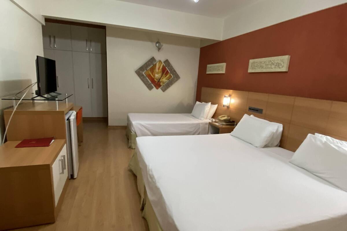 deluxe triple room | minibar, in-room safe, blackout curtains, soundproofing