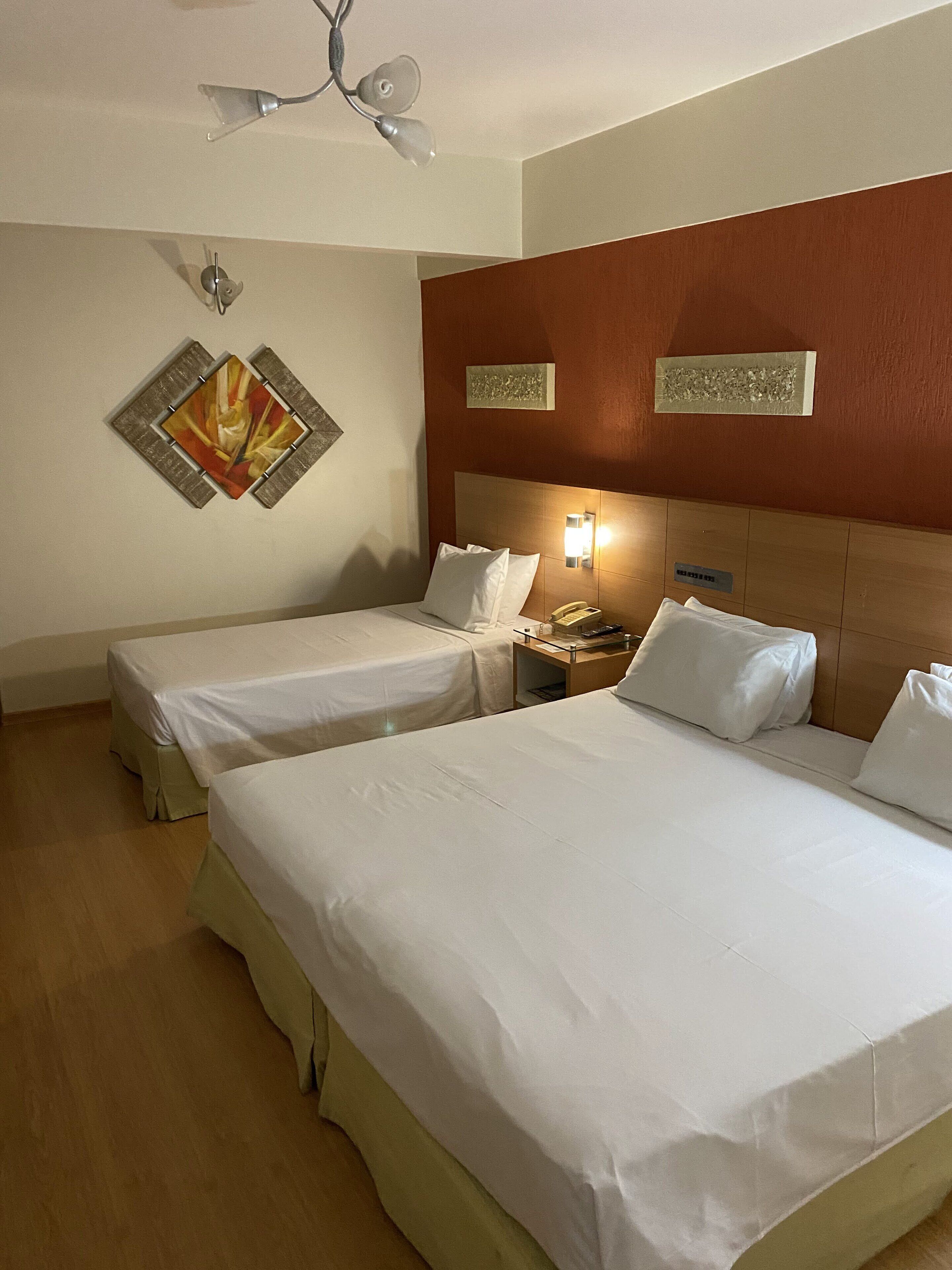 deluxe triple room | minibar, in-room safe, blackout curtains, soundproofing