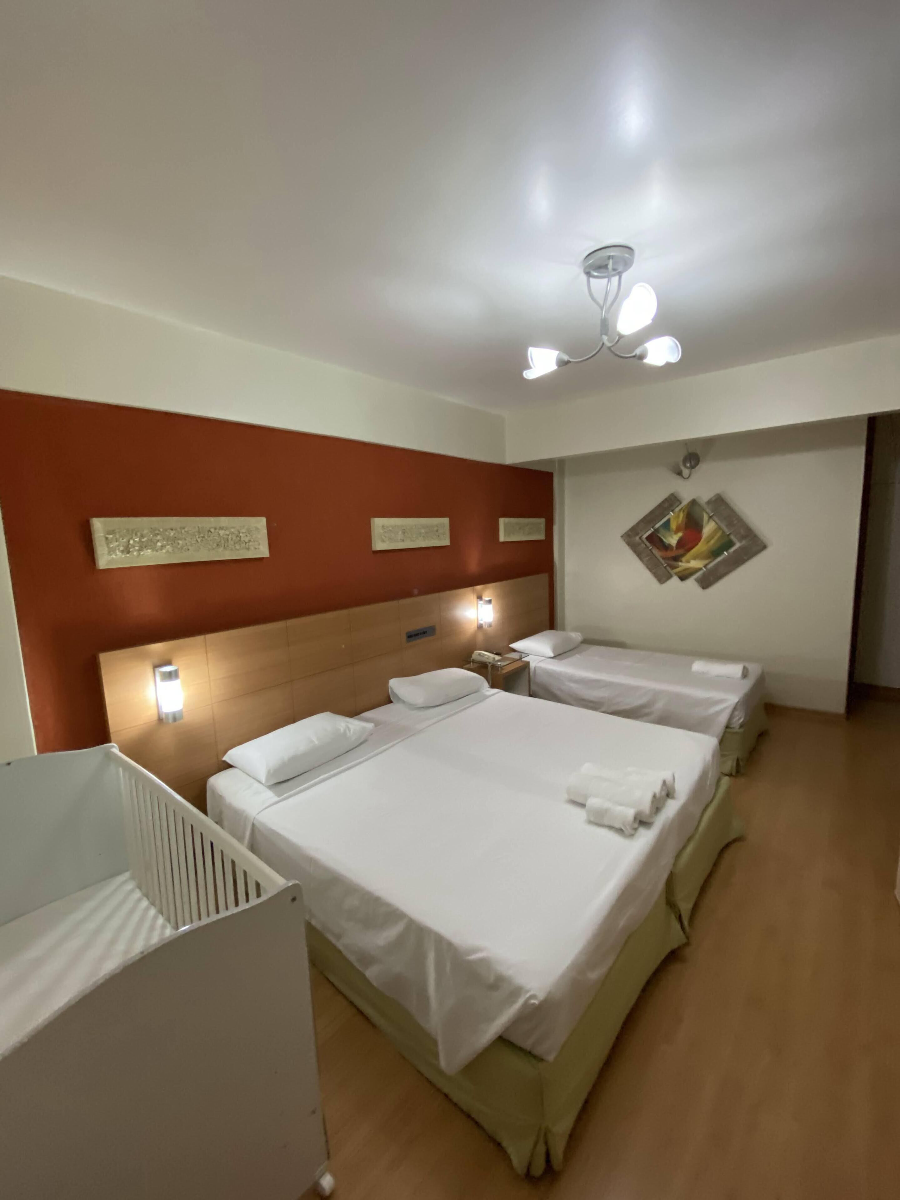 deluxe triple room | minibar, in-room safe, blackout curtains, soundproofing