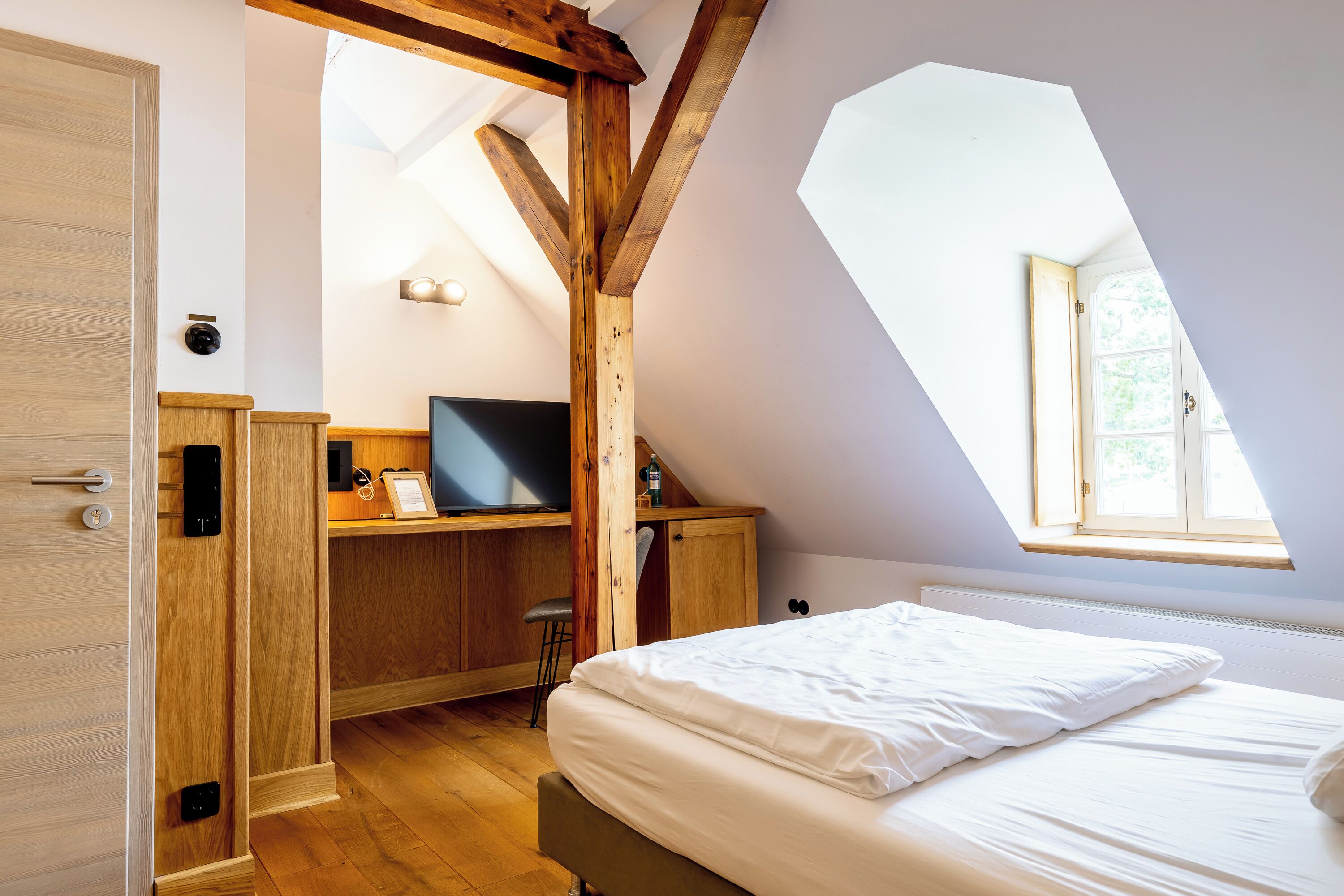 comfort single room (mansard) | hypo-allergenic bedding, minibar, in-room safe, individually decorated