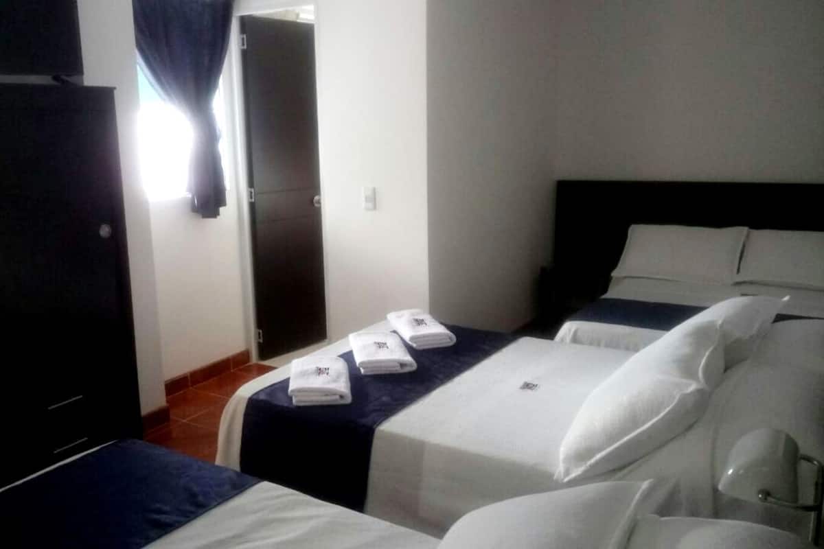 Family Room | Minibar, desk, iron/ironing board, free WiFi