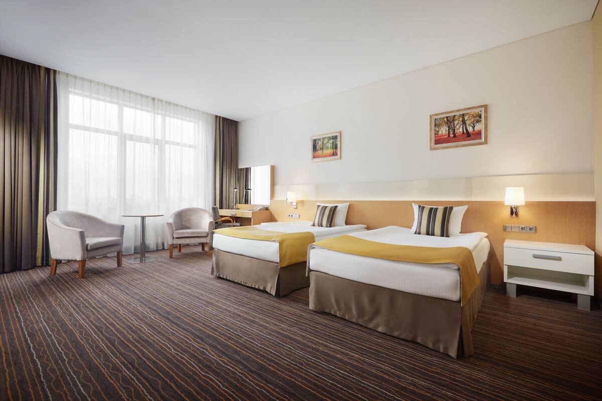Comfort Twin Room with Aquazone access | In-room safe, desk, soundproofing, iron/ironing board (on request)