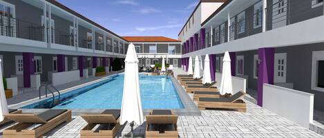 Una piscina con sillas de descanso y sombrillas, rodeada de edificios con detalles morados.