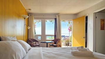 Individually decorated, desk, blackout curtains, iron/ironing board