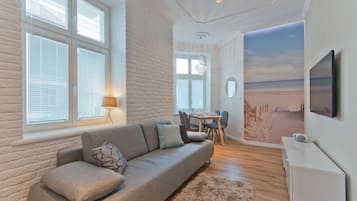 Appartement | Woonkamer | Flatscreentelevisie
